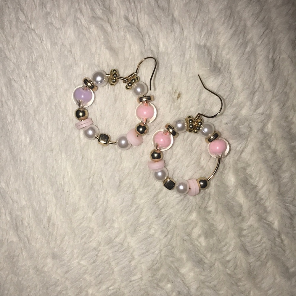 selling a park of clay earring and fake pearls perfect for prom or sticking out!